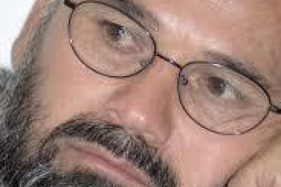 CEO Abdullah Pledges Reassessment of Afghan Photographer's Case